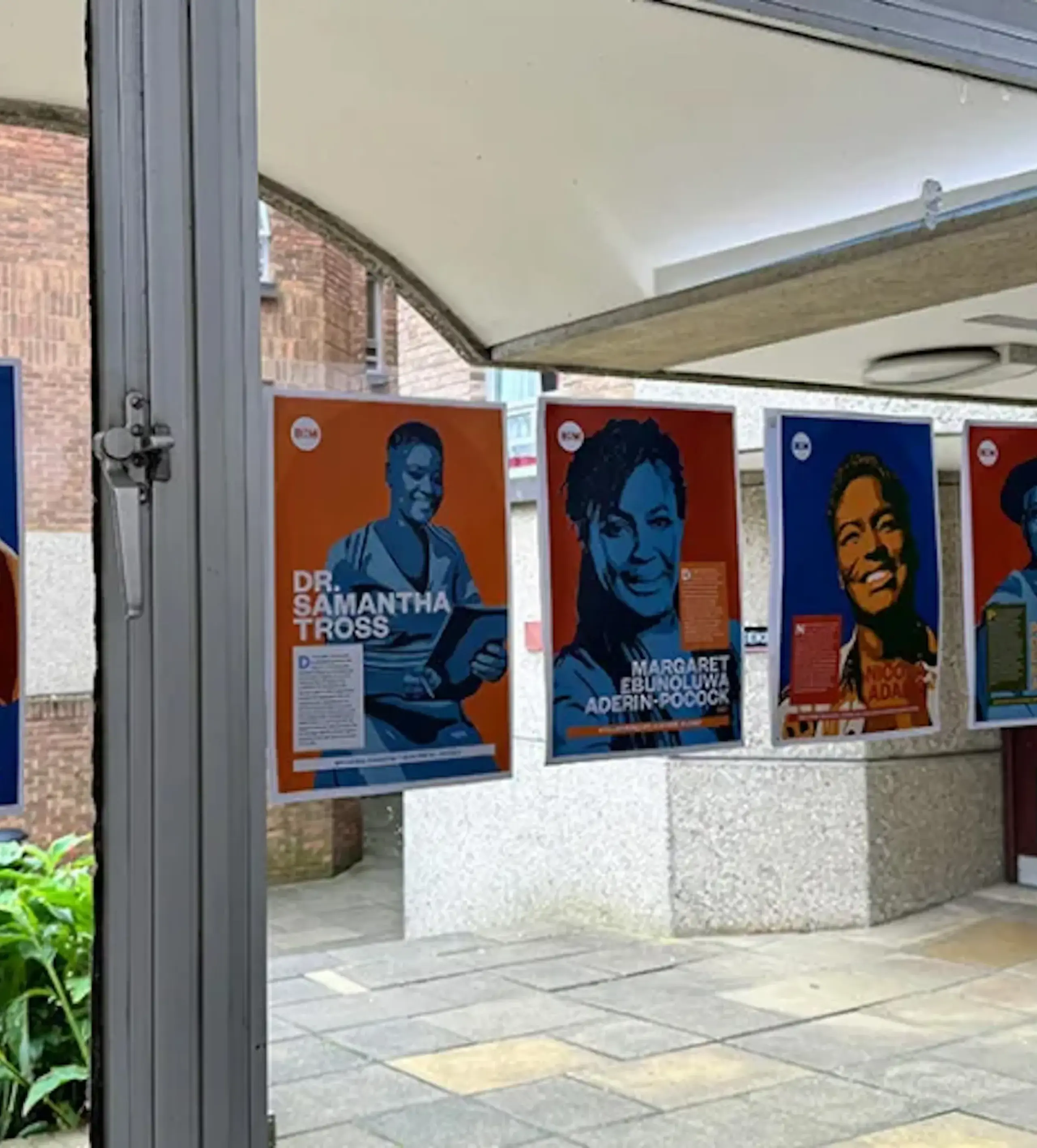 Window display showing portraits of prominent Black figures