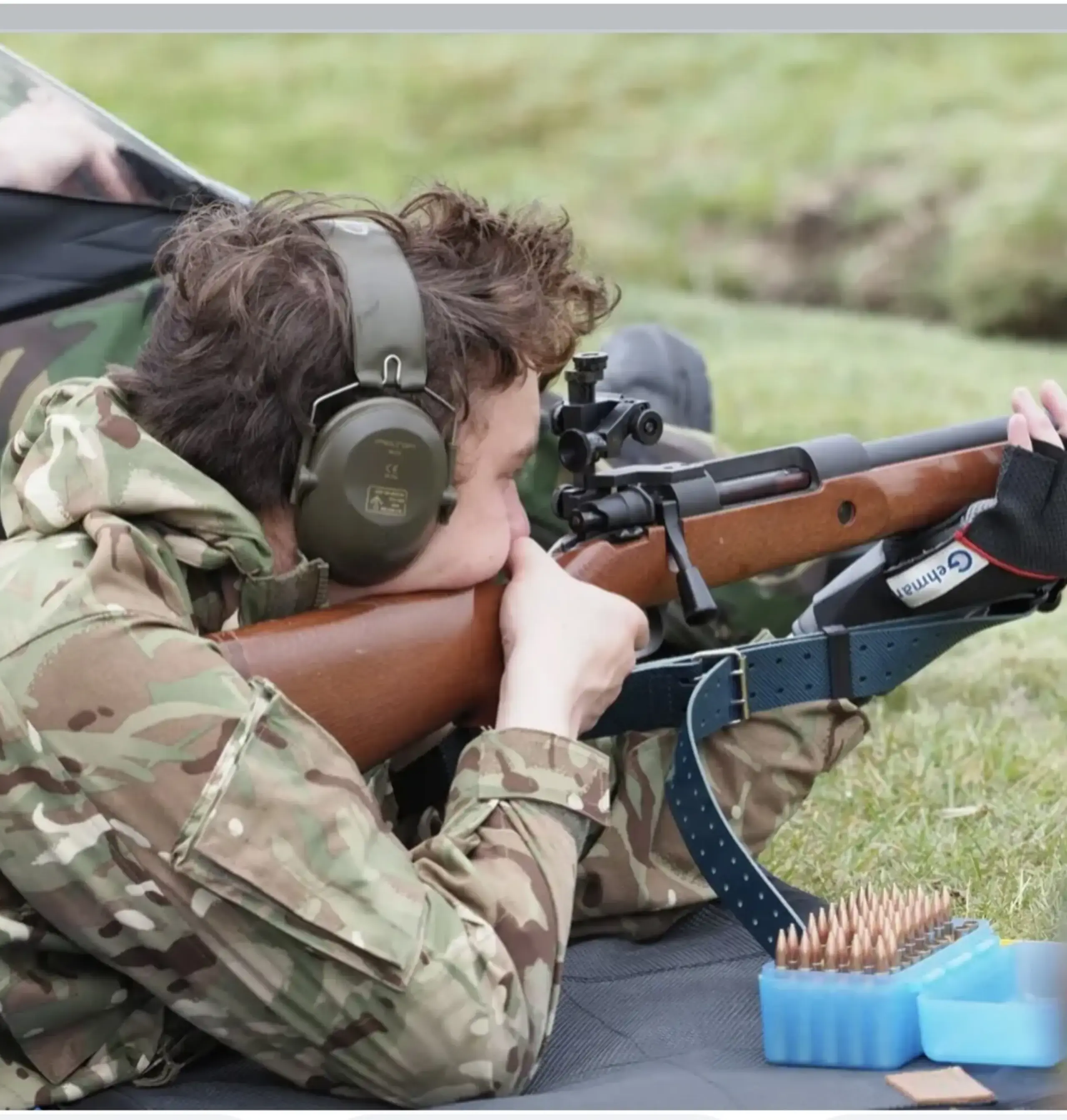 Student readying to shoot a rifle